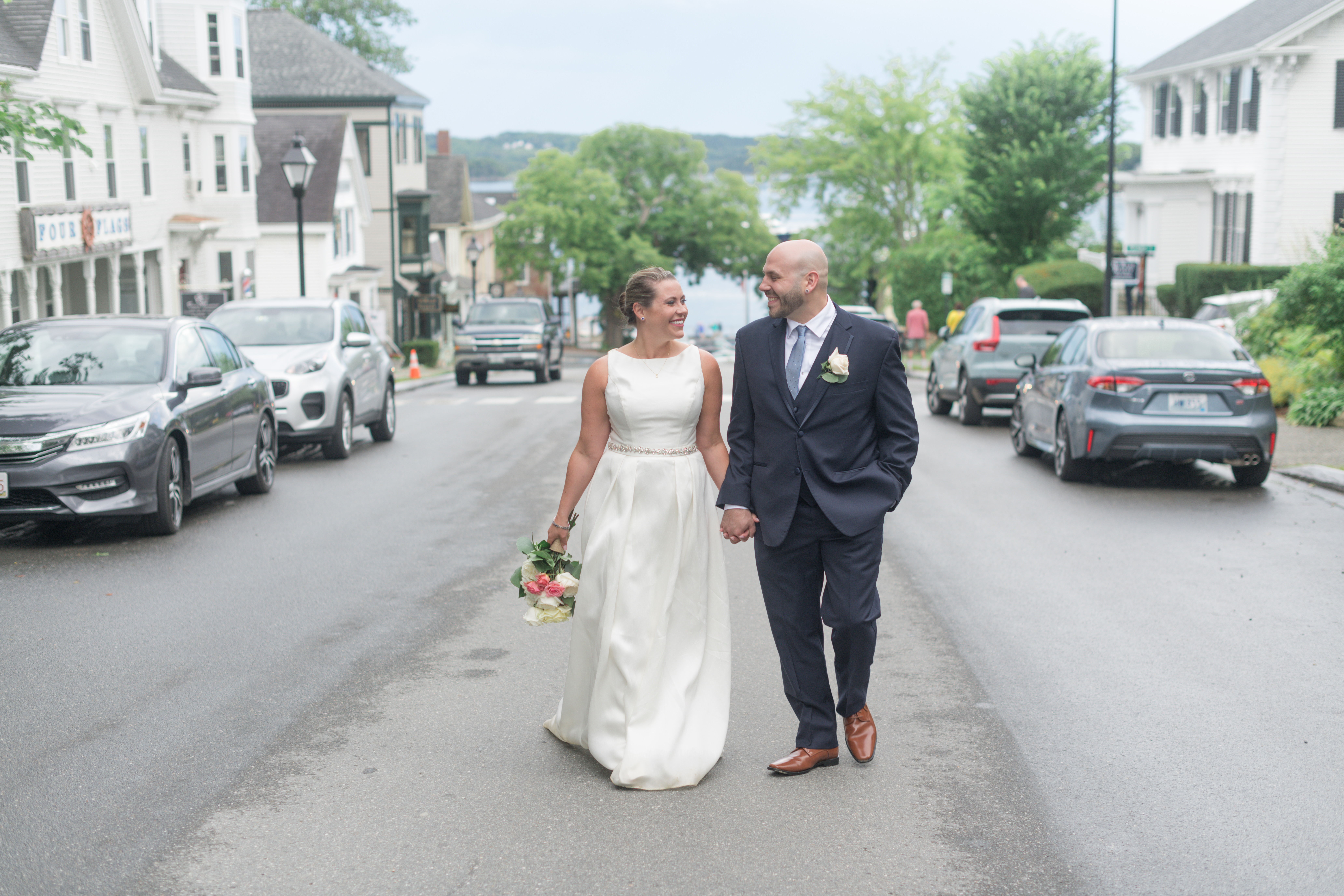 Castine bride and groom on Main street after ceremony at Wilson museum